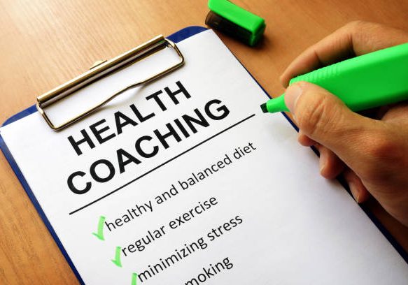 Clipboard with health coaching list. Healthy living concept.